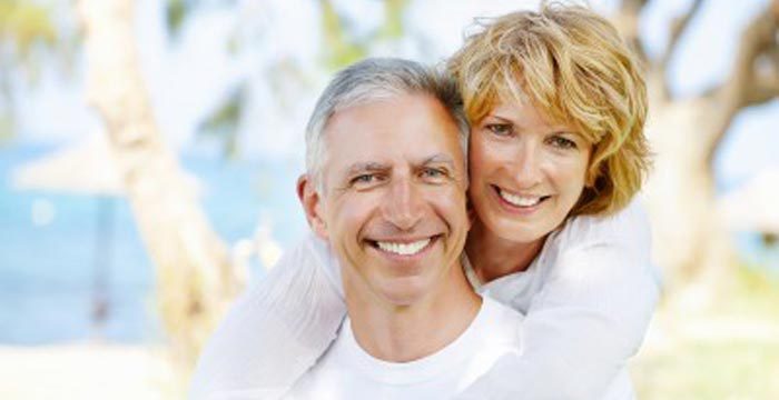 couple with tooth replacement